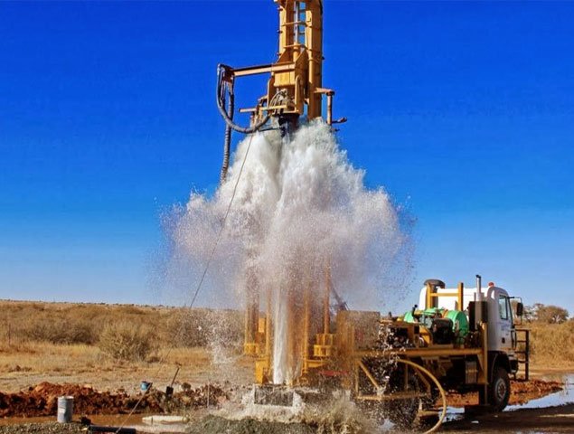 Borehole drilling and pumping test